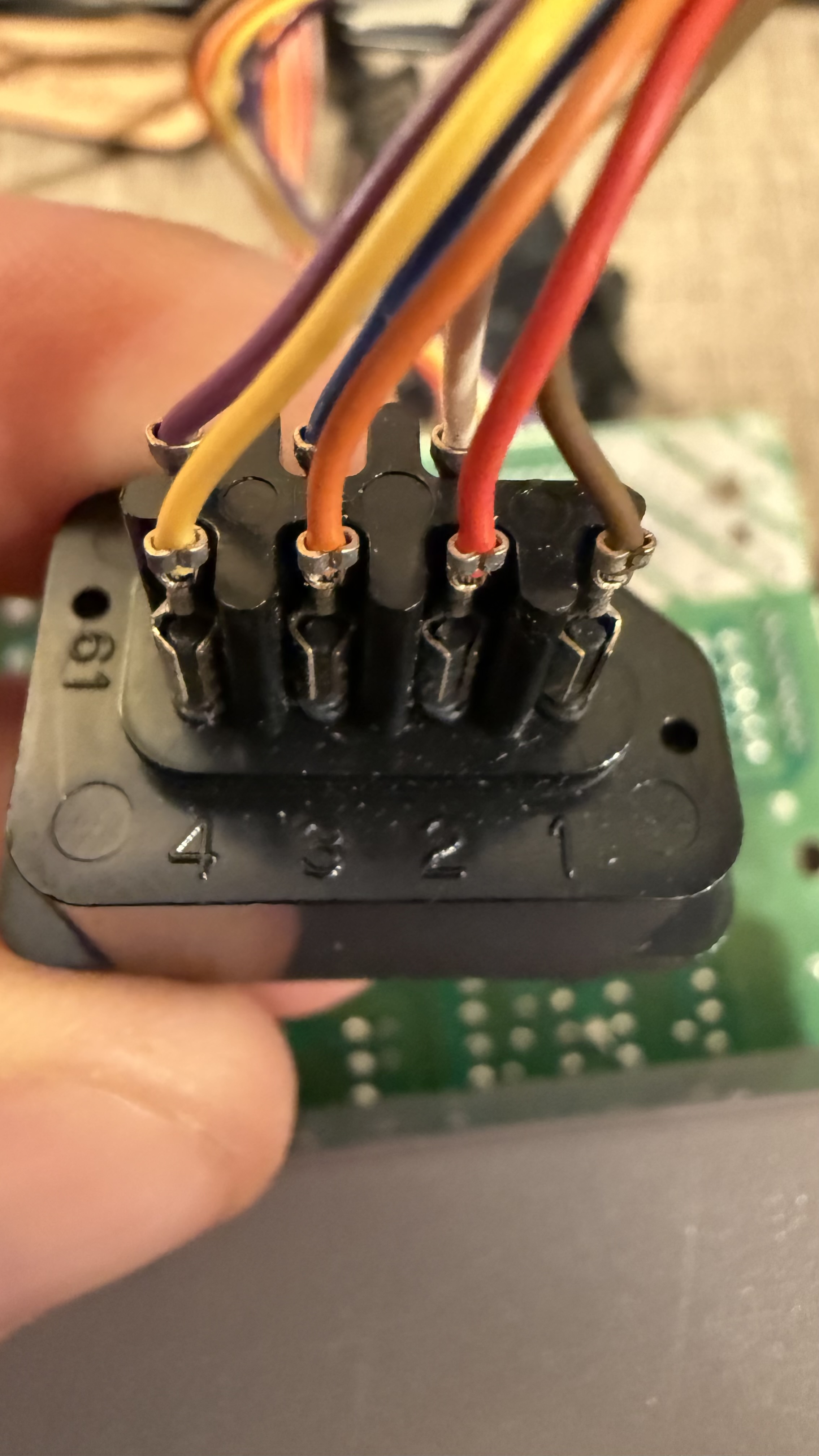 The controller harness's colours against the port's pins